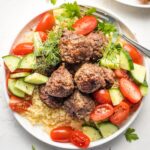 Za'atar-spiced lamb meatballs on a plate.