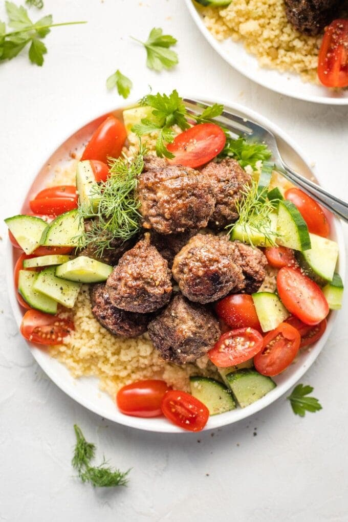 Za'atar-spiced lamb meatballs on a plate.