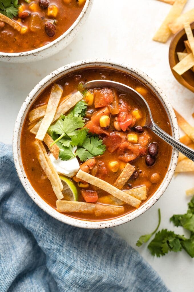 A bowl of vegetarian tortilla soup.