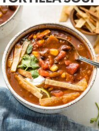 This chipotle black bean tortilla soup is easy and full of smoky, bright Mexican flavors. Gluten-free, vegan, perfect for busy weeknights!