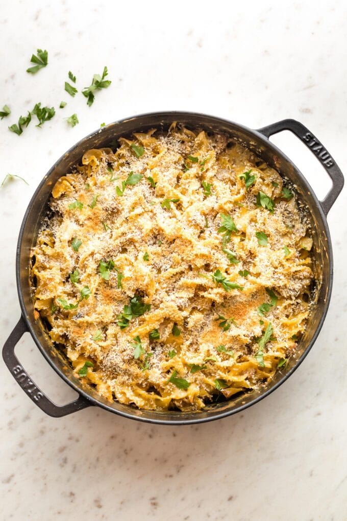 Cooked sausage noodle casserole in a pan.