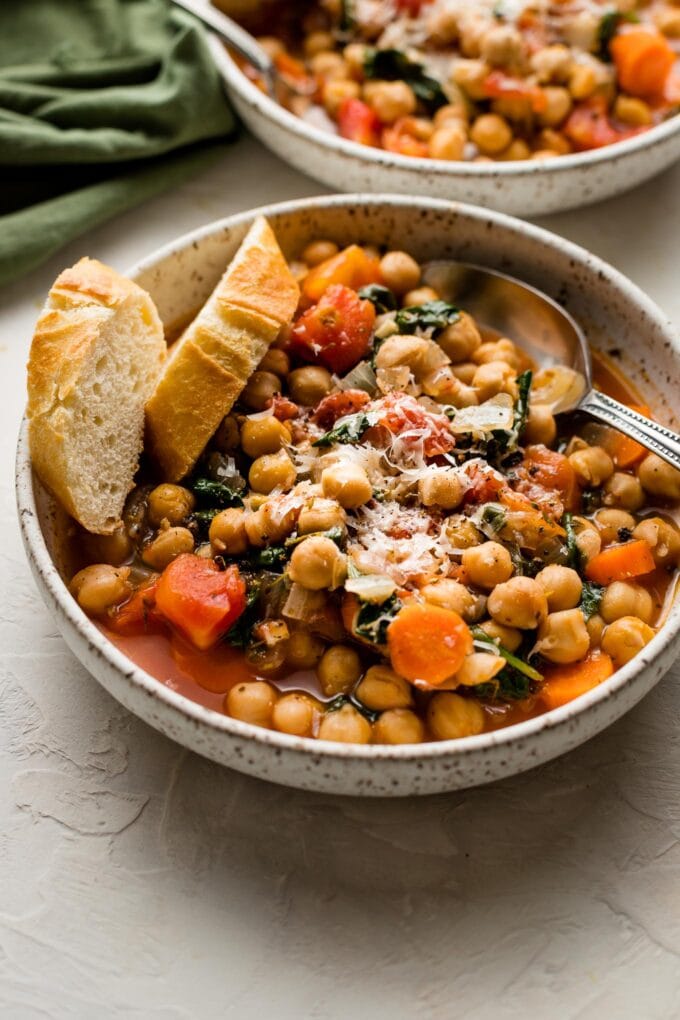 Tuscan chickpea stew served with bread and Parmesan.