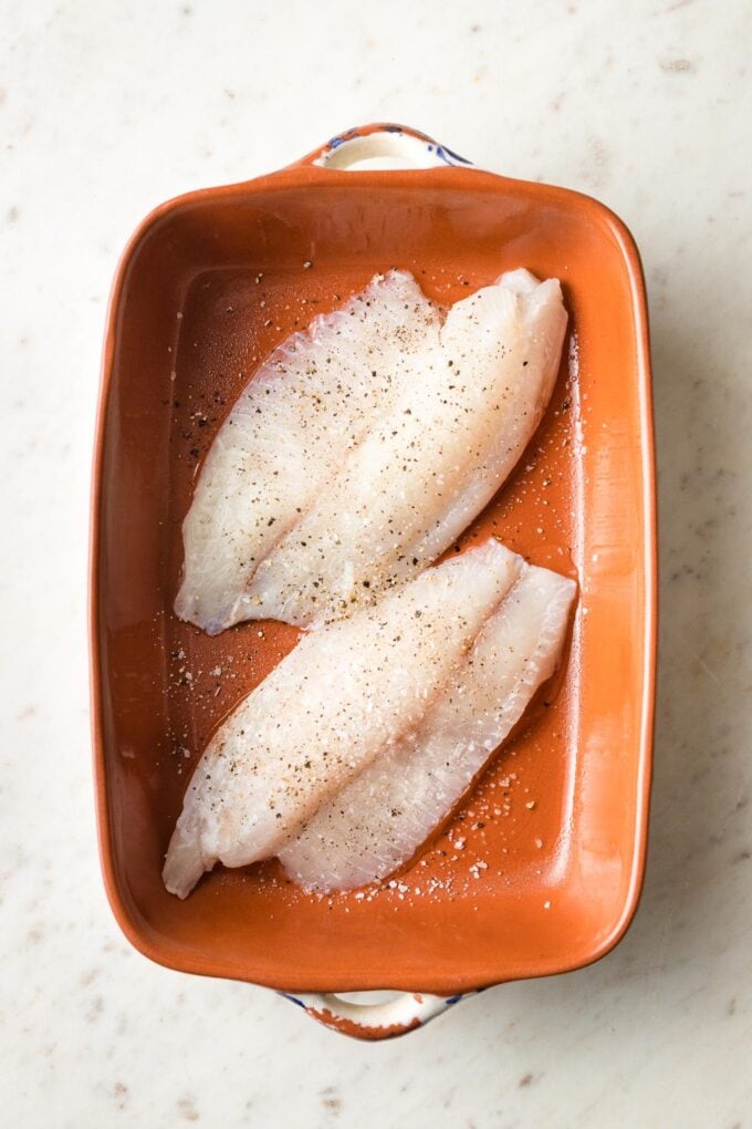 Seasoned filets in pan.