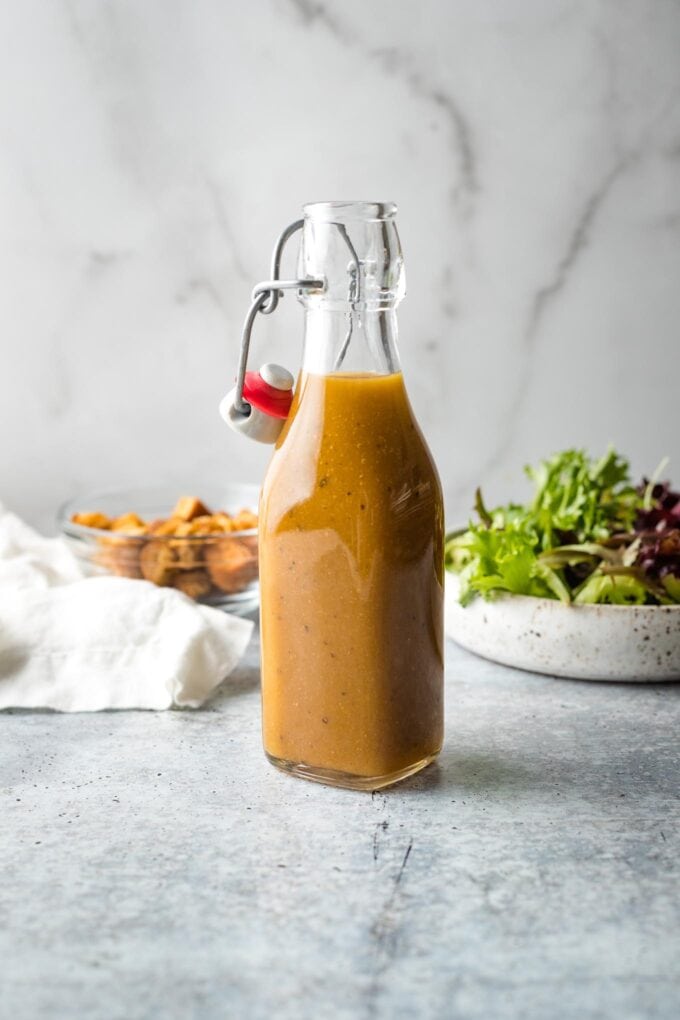 Small bottle holding homemade balsamic vinaigrette.