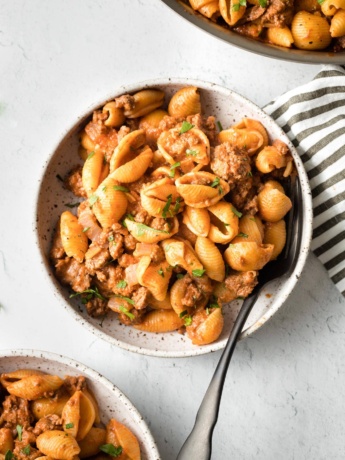 Bowls of chili garlic beef and shells.