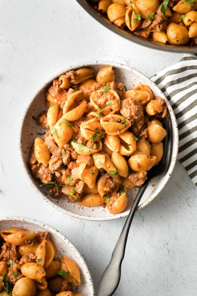 Bowls of chili garlic beef and shells.