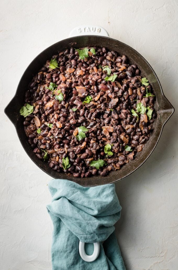 Pan with cooked black beans.