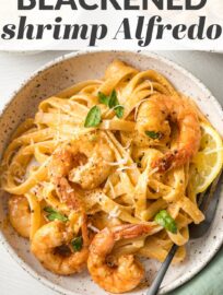Blackened Shrimp Alfredo is a home-run dish with pan-fried shrimp and tender pasta swimming in a simple yet irresistible cream sauce. You can easily control the heat and have this impressive meal on the table in 30 minutes.