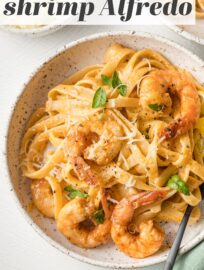 Blackened Shrimp Alfredo is a home-run dish with pan-fried shrimp and tender pasta swimming in a simple yet irresistible cream sauce. You can easily control the heat and have this impressive meal on the table in 30 minutes.