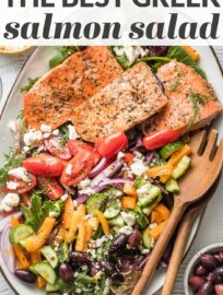 This simple Greek Salmon Salad with pan-seared filets, a rainbow of fresh veggies, and an easy Mediterranean-inspired vinaigrette makes a deliciously feel-good lunch or dinner.