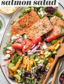 This simple Greek Salmon Salad with pan-seared filets, a rainbow of fresh veggies, and an easy Mediterranean-inspired vinaigrette makes a deliciously feel-good lunch or dinner.