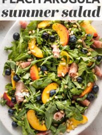 This Peach Arugula Salad is a summer stunner that feels elegant but comes together in no time, perfect for a nice dinner or entertaining!