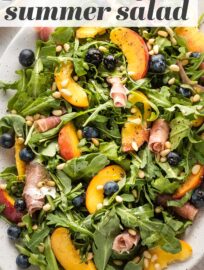 This Peach Arugula Salad is a summer stunner that feels elegant but comes together in no time, perfect for a nice dinner or entertaining!