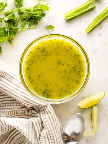 Jar full of cilantro lime dressing.