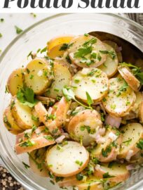 This Herb Potato Salad is packed with fresh herbs, tangy shallots, and a creamy Djion lemon vinaigrette. It's easy to make in about 20 minutes and keeps well, perfect for parties, picnics, and potlucks!
