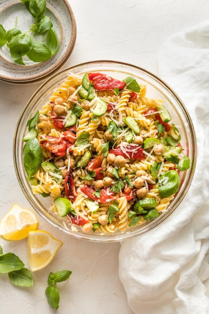 Bowl with assembled pasta salad.