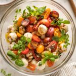 Bowl of marinated mozzarella salad.