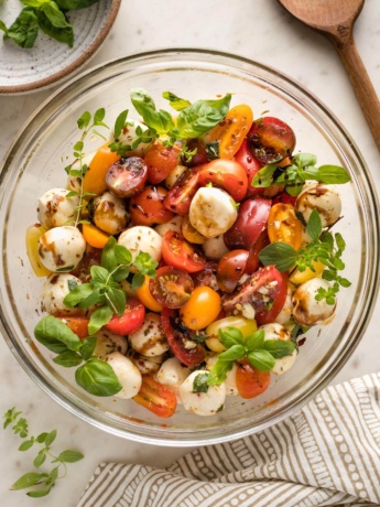 Bowl of marinated mozzarella salad.