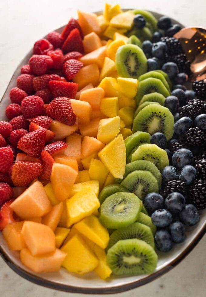 Side angle view of fruit rainbow on a platter.
