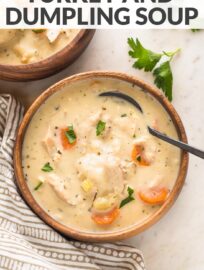 Cozy, easy to make, and completely delicious, these bowls of creamy turkey and dumplings will satisfy you and put extra turkey to good use!