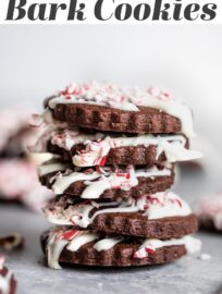 Peppermint bark cookies are seriously fun, festive, and delicious! A thin, tender chocolate cookie drizzled with white chocolate and sprinkled with crushed candies, this is the traditional peppermint bark you love converted into an adorable cookie.