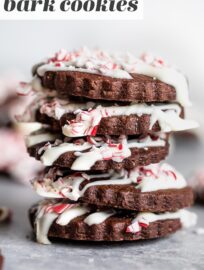 Peppermint bark cookies are seriously fun, festive, and delicious! A thin, tender chocolate cookie drizzled with white chocolate and sprinkled with crushed candies, this is the traditional peppermint bark you love converted into an adorable cookie.