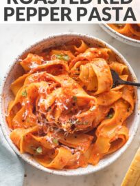 This creamy roasted red pepper pasta is a luxurious but easy dinner ready in just 30 minutes. Perfect with a sprinkle of basil and Parmesan!