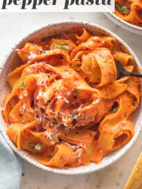 This creamy roasted red pepper pasta is a luxurious but easy dinner ready in just 30 minutes. Perfect with a sprinkle of basil and Parmesan!