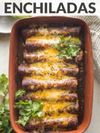 Quick, easy, and oh so flavorful, these Black Bean and Corn Enchiladas will be a new family favorite! They're so delicious and filling, no one will ever miss the meat. Top with sauce, cheese, avocado, and cilantro for a meatless Mexican recipe everyone will enjoy!