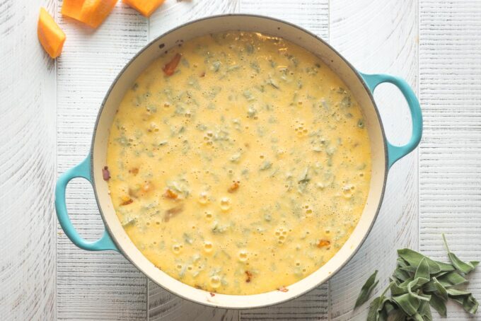 Egg mixture poured on top of cooked butternut squash.