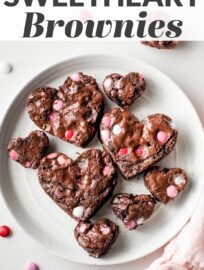 These easy and adorable heart shaped brownies are perfect for Valentine's Day! Fudgy brownies packed with chocolate chips and pink M&Ms, cut into cute heart shapes for maximum sweetness.