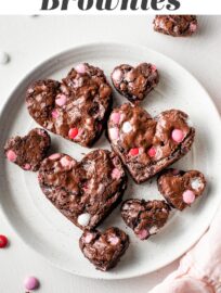 These easy and adorable heart shaped brownies are perfect for Valentine's Day! Fudgy brownies packed with chocolate chips and pink M&Ms, cut into cute heart shapes for maximum sweetness.