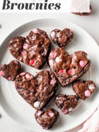 These easy and adorable heart shaped brownies are perfect for Valentine's Day! Fudgy brownies packed with chocolate chips and pink M&Ms, cut into cute heart shapes for maximum sweetness.