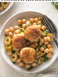 Serve these Sesame Spiced Chicken Meatballs with a tangy chickpea salad for a satisfying and healthy dinner you can make in just about 30 minutes. The tender meatballs are quickly browned, then baked in the oven, while the chickpea salad comes together in a snap.
