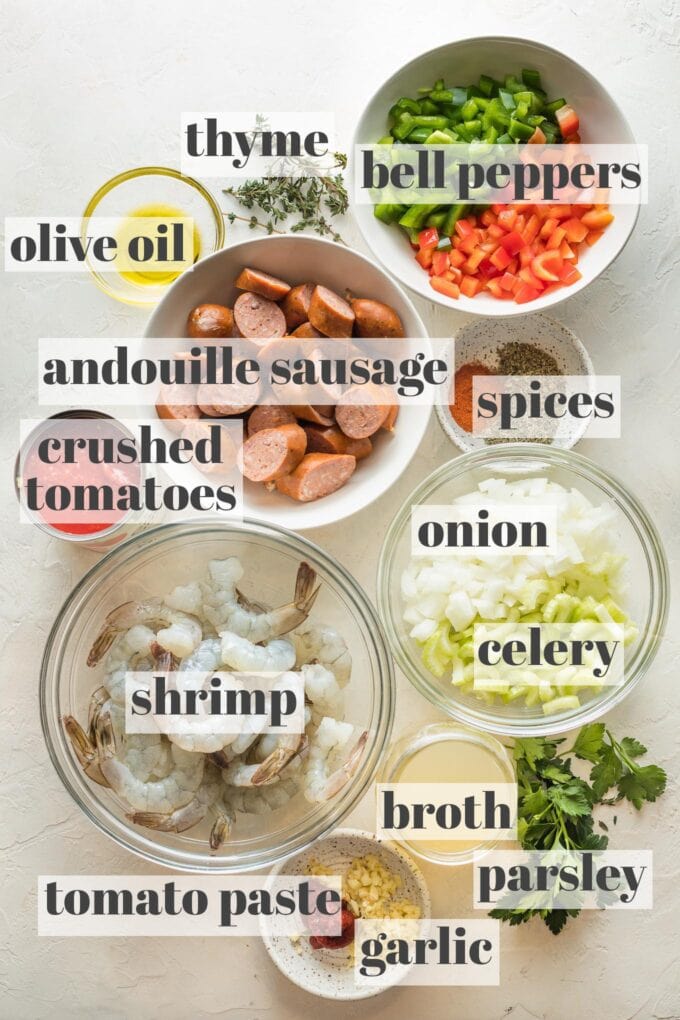 Labeled photo of prep bowls with ingredients for a no rice jambalaya.