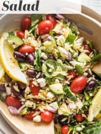 This simple and flavorful Lemon Orzo Salad is so easy to toss together and is a perfect side dish or light main. It's packed with creamy feta, crisp cucumbers, tangy olives, fresh herbs, and a simple yet delicious lemon vinaigrette.