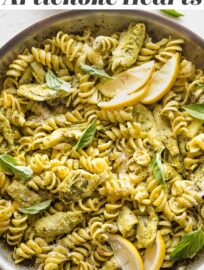 This fresh Pasta with Artichoke Hearts, pesto, and lemon is an elegant vegetarian meal that is packed with flavor. The light pesto cream sauce finishes off a well-balanced dish that is ready in just 25 minutes.