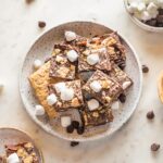 Small plate with stack of s'mores fudge pieces.