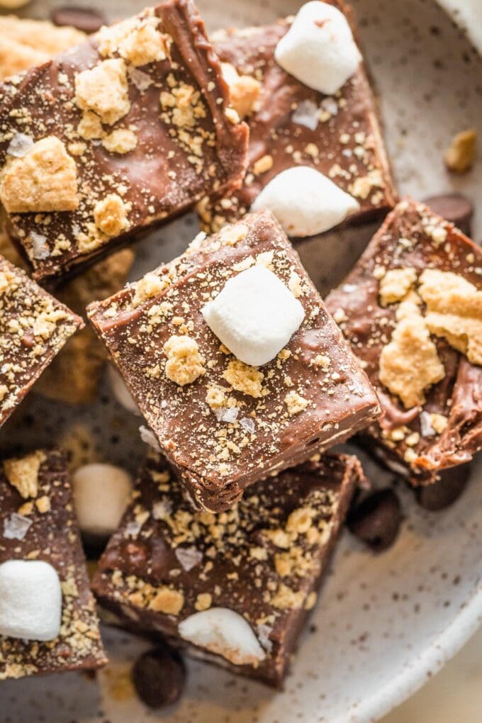 Close up of flaky sea salt topping a S'mores-flavored piece of fudge.