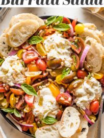 This Tomato Burrata Salad is as delicious as it is beautiful, and easy to throw together, too. Marinating the tomatoes gives this a little extra oomph, and makes it especially elegant for dinner guests or casual summer gatherings.