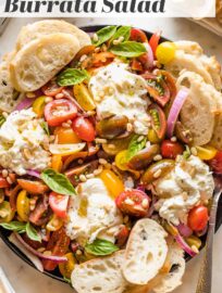 This Tomato Burrata Salad is as delicious as it is beautiful, and easy to throw together, too. Marinating the tomatoes gives this a little extra oomph, and makes it especially elegant for dinner guests or casual summer gatherings.