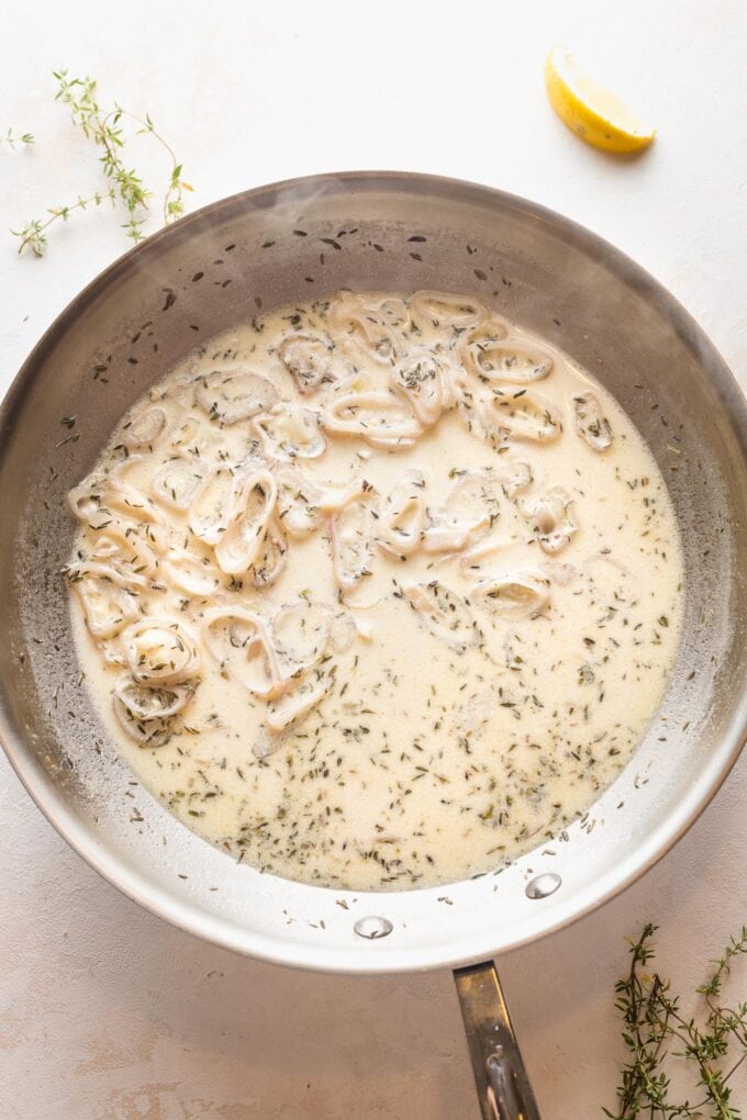 Cream added to white wine sauce, along with lemon juice and thyme.