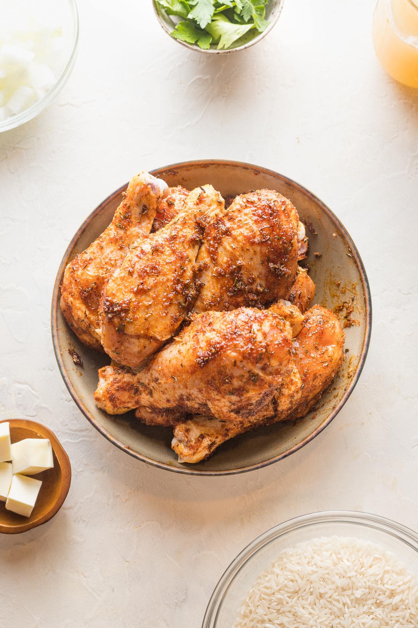 Chicken drumsticks rubbed with an olive oil and brown sugar spice mixture.