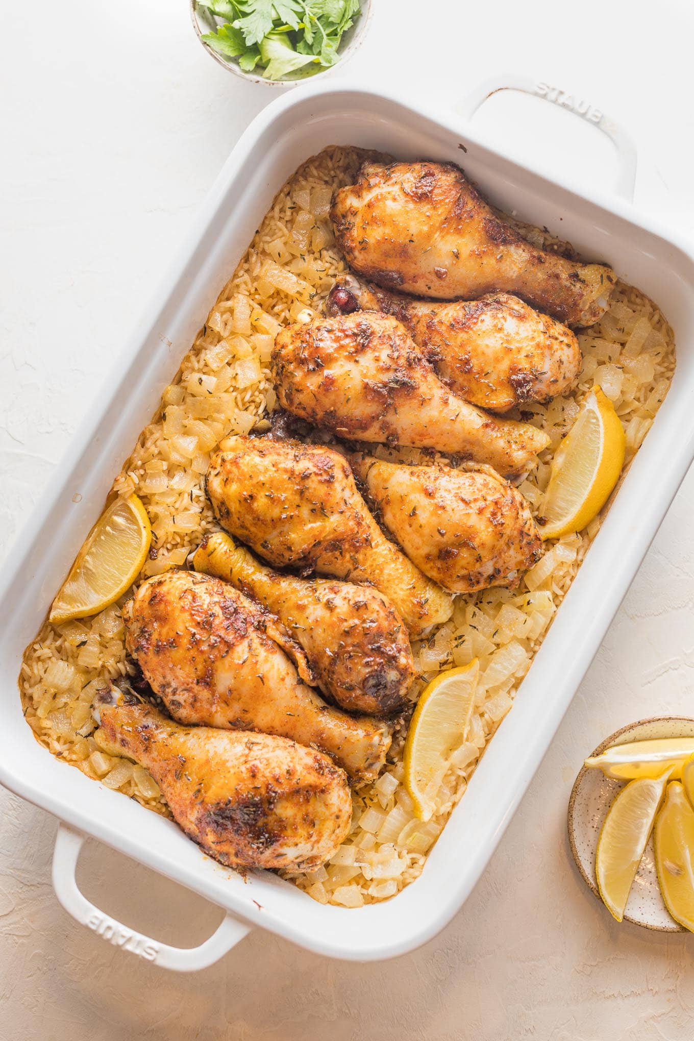 Baked chicken legs and rice.
