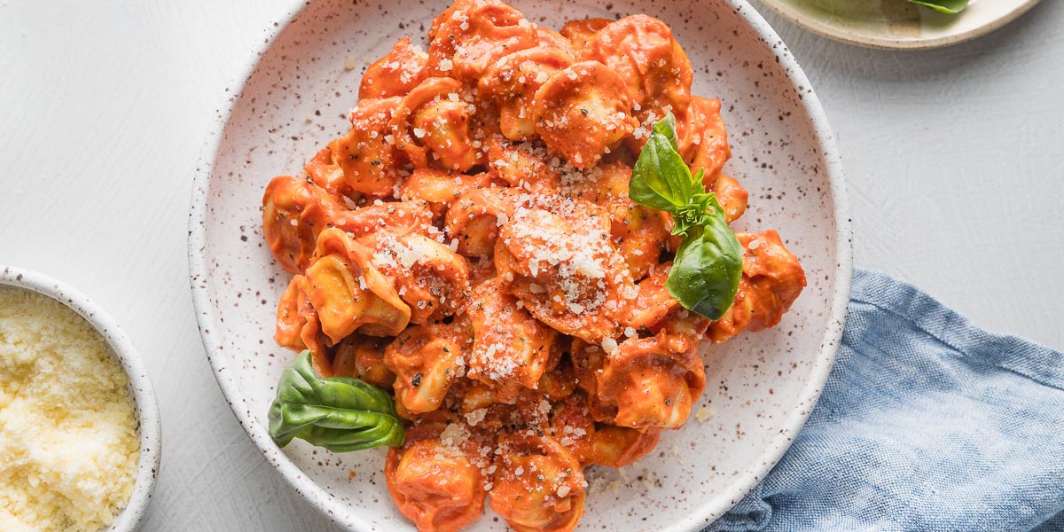 Tortellini with Creamy Tomato Sauce - Nourish and Fete