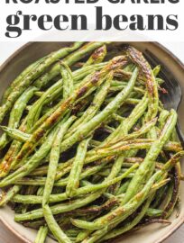 Roasted garlic green beans are the ultimate easy side dish when you need something hands off but full of flavor. Five minutes to prep, 20 minutes to roast, and so delicious you just may find yourself sneaking a few before they hit the dinner table.