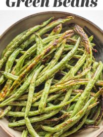 Roasted garlic green beans are the ultimate easy side dish when you need something hands off but full of flavor. Five minutes to prep, 20 minutes to roast, and so delicious you just may find yourself sneaking a few before they hit the dinner table.