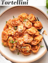 This easy recipe for tortellini with creamy tomato sauce will help you make a delicious, real food dinner in just 15 minutes! The tortellini cook right in the sauce for a true one pan wonder with rich flavor.