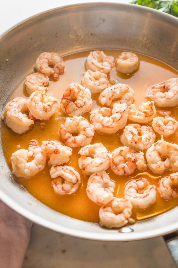 Just-cooked Argentine red shrimp in a light garlic butter lemon pan sauce.