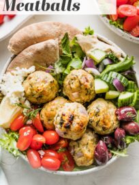 Tender, versatile Greek Chicken Meatballs are easy to make and packed with delicious Mediterranean flavors. Serve in bowls, salads, or pita with your favorite veggies and drizzles of tzatziki or homemade Greek dressing. I love to bake them for the hands-off convenience, but they're easy to pan fry, as well.